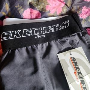 One Kio  & Two Sketcher Scrub Pants